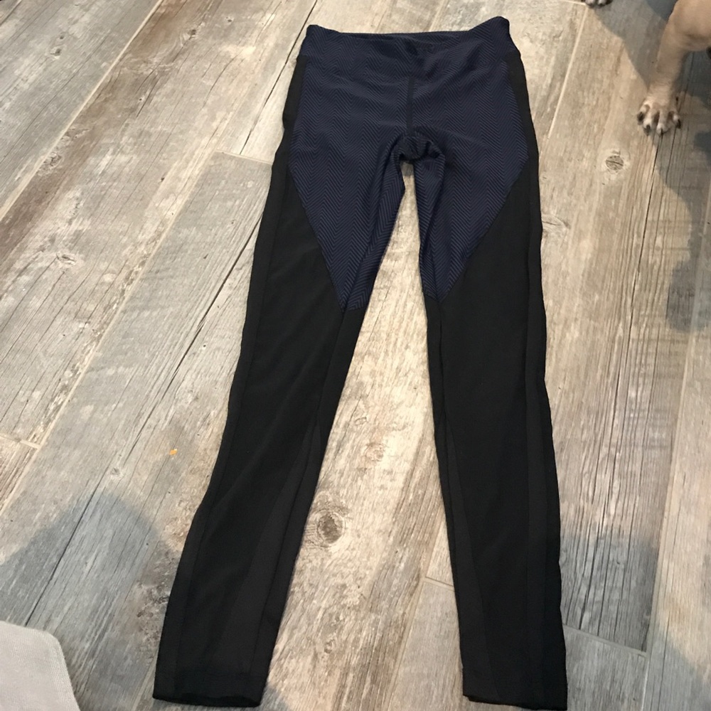 Koral Activewear blue and black mesh legging.